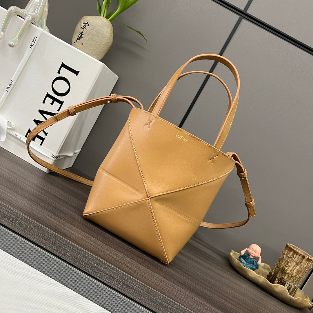 Puzzle fold tote in calfskin