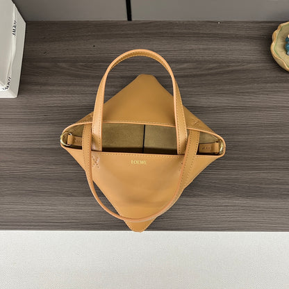 Puzzle fold tote in calfskin