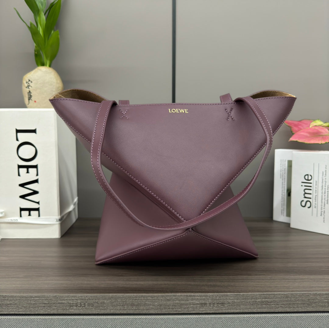 Puzzle fold tote in calfskin