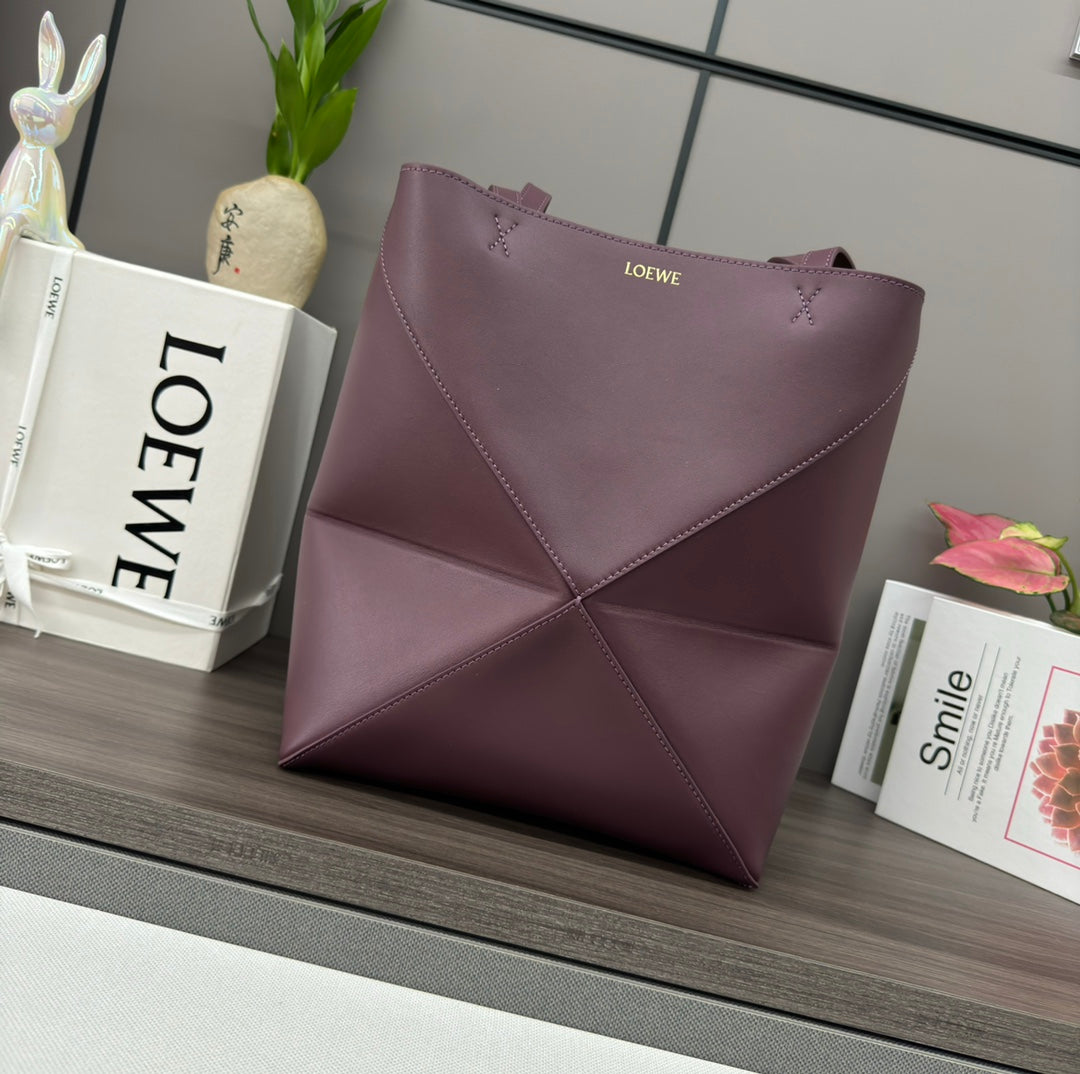 Puzzle fold tote in calfskin