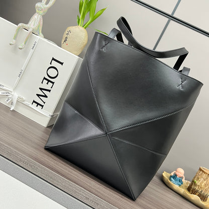 Puzzle fold tote in calfskin