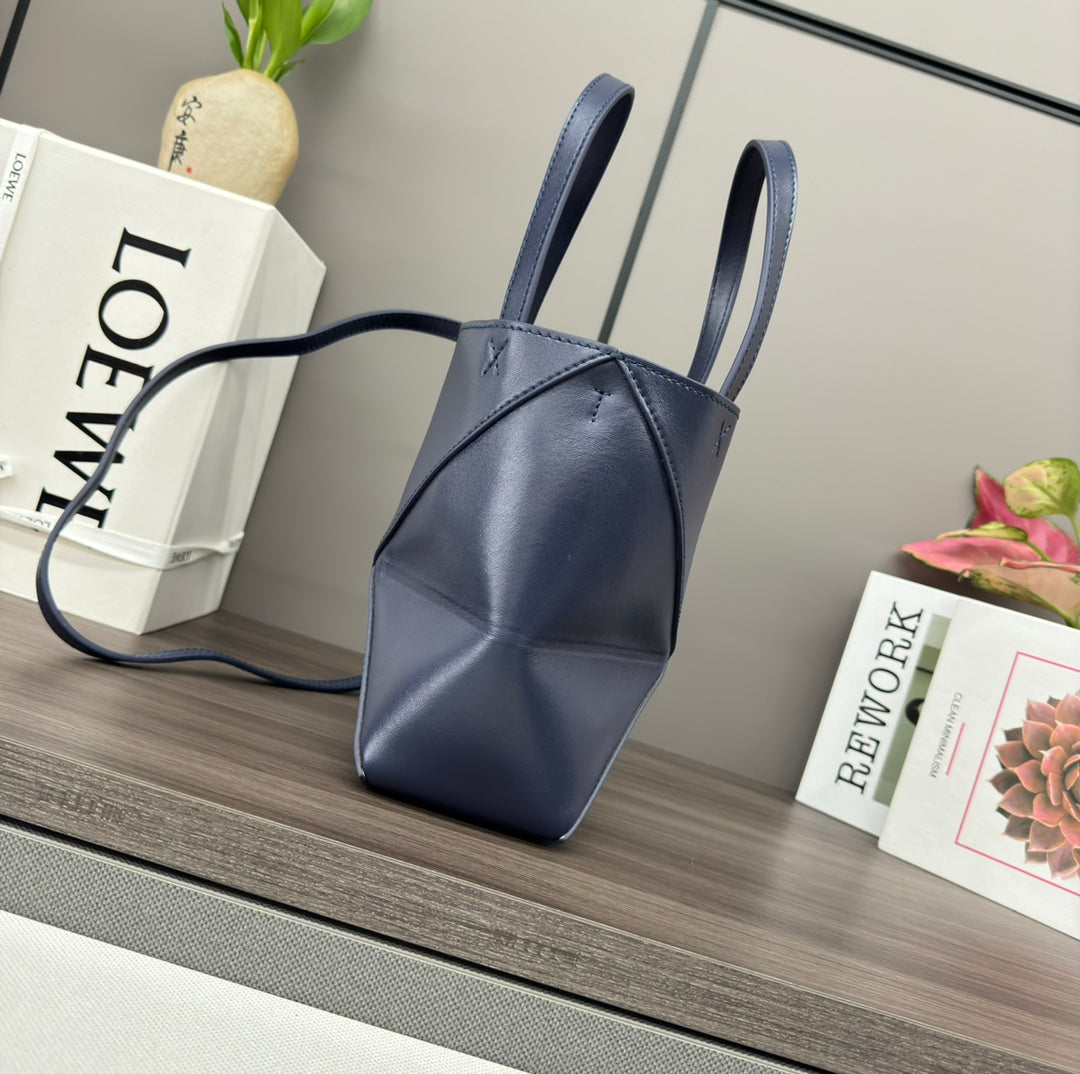 Puzzle fold tote in calfskin