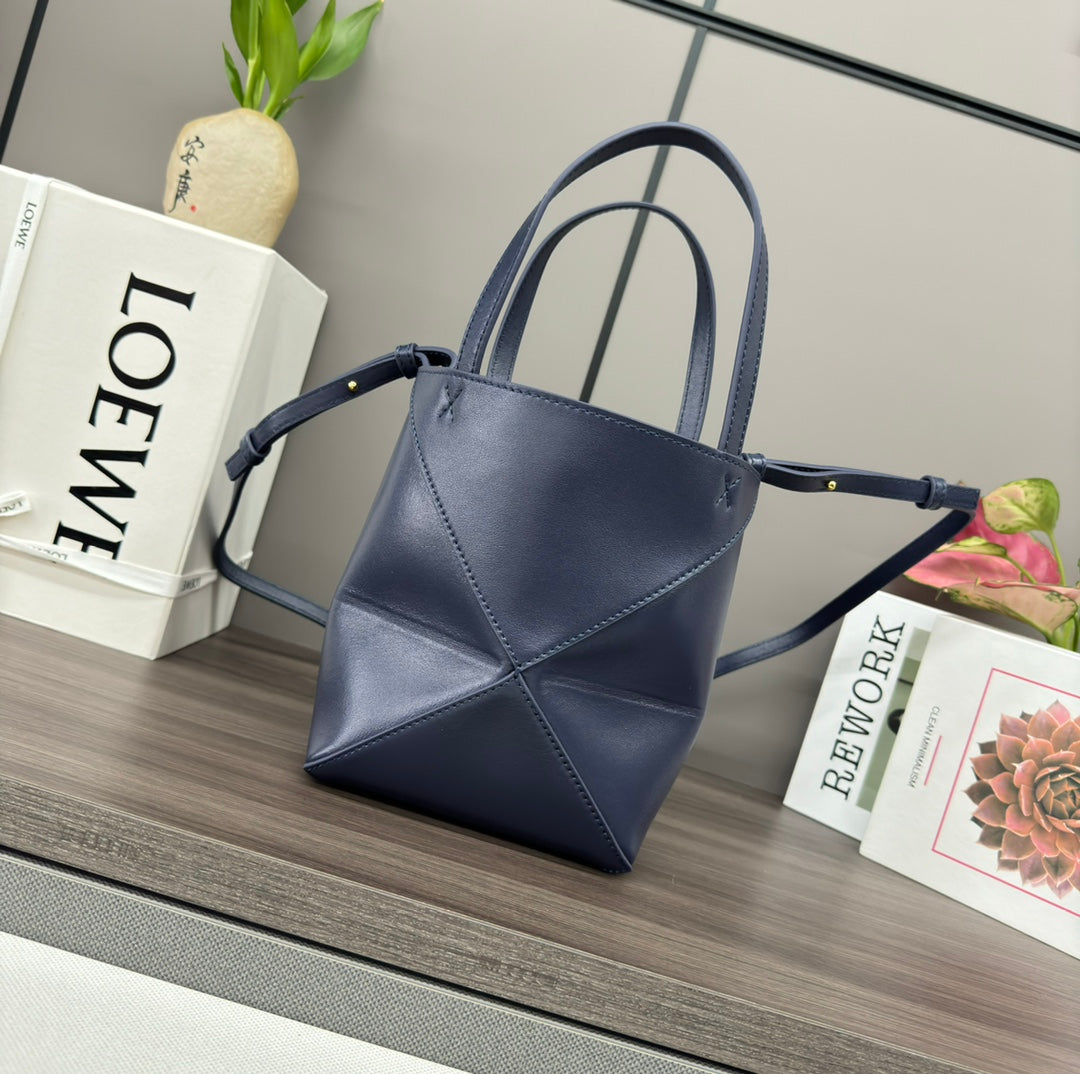 Puzzle fold tote in calfskin