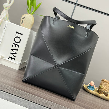 Puzzle fold tote in calfskin