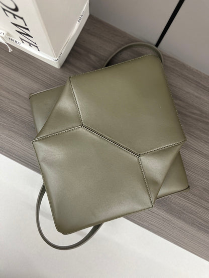 Puzzle fold tote in calfskin