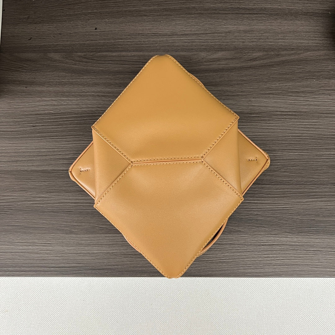 Puzzle fold tote in calfskin