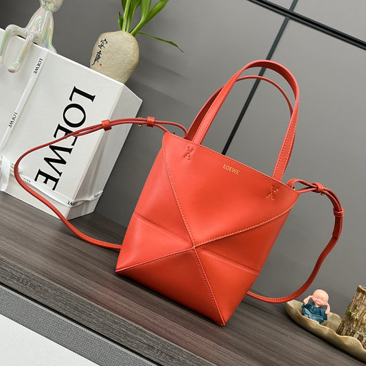 Puzzle fold tote in calfskin