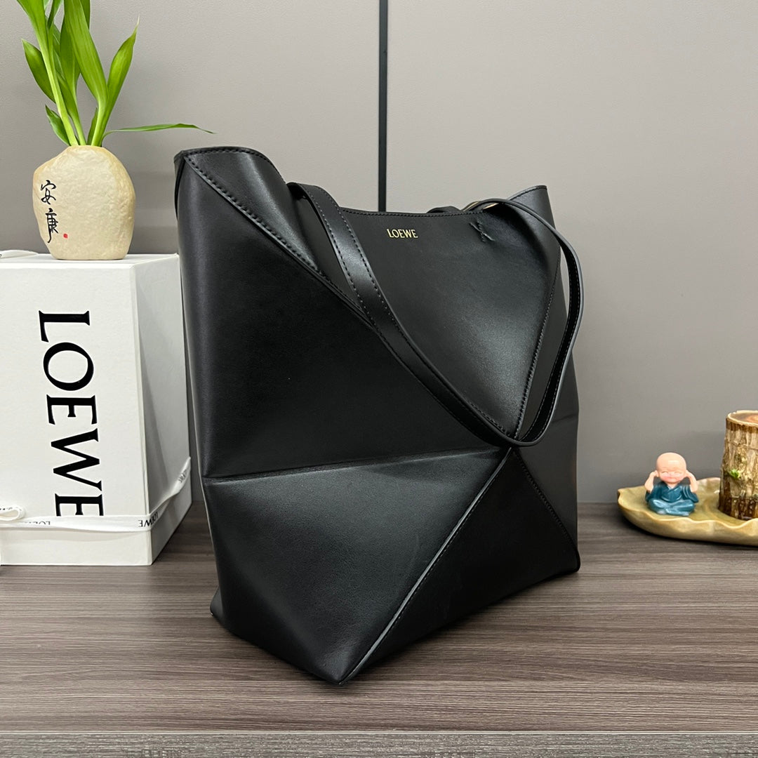 Puzzle fold tote in calfskin