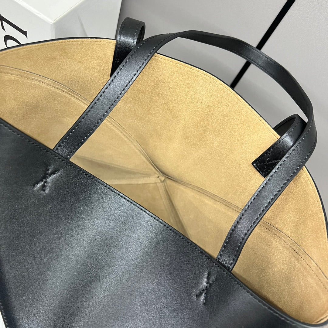 Puzzle fold tote in calfskin