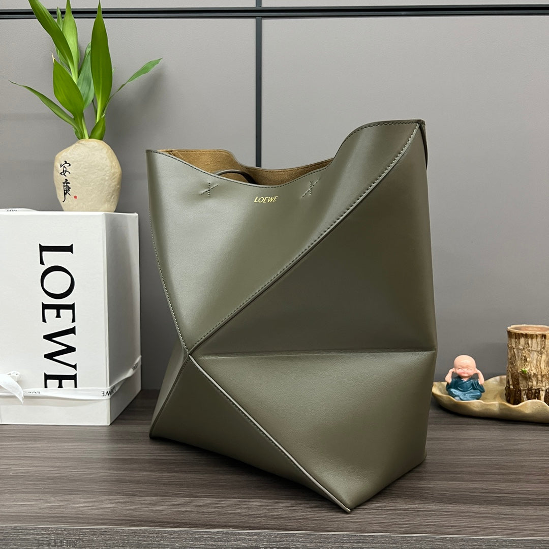 Puzzle fold tote in calfskin