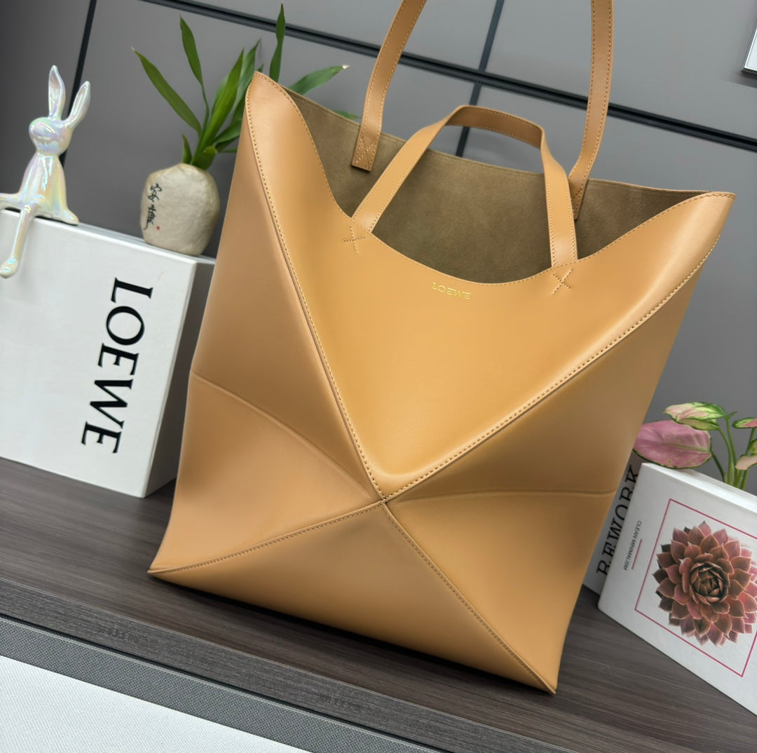 Puzzle fold tote in calfskin