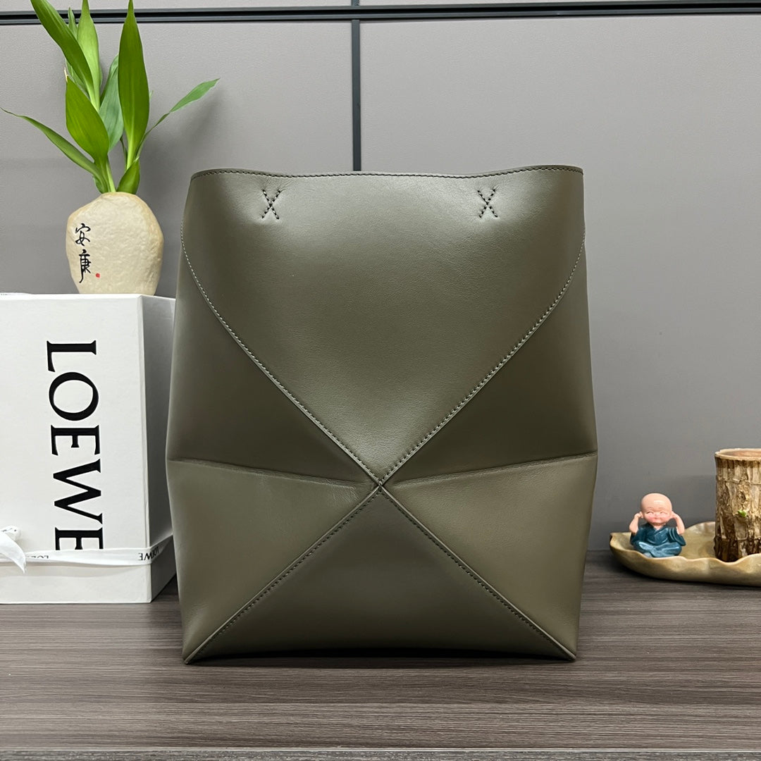 Puzzle fold tote in calfskin