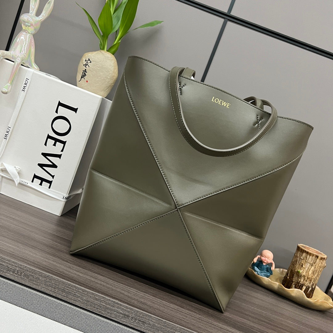 Puzzle fold tote in calfskin