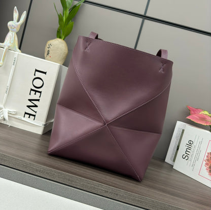 Puzzle fold tote in calfskin