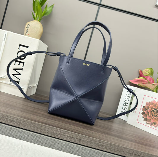 Puzzle fold tote in calfskin