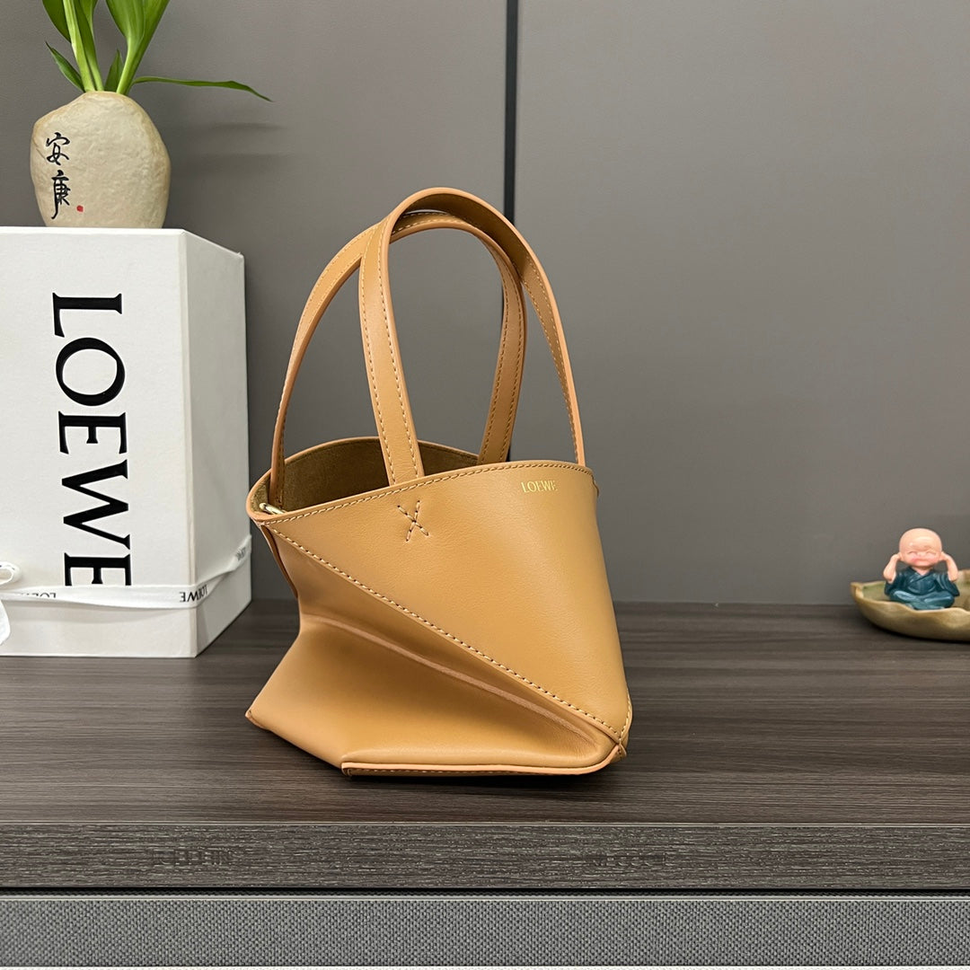 Puzzle fold tote in calfskin