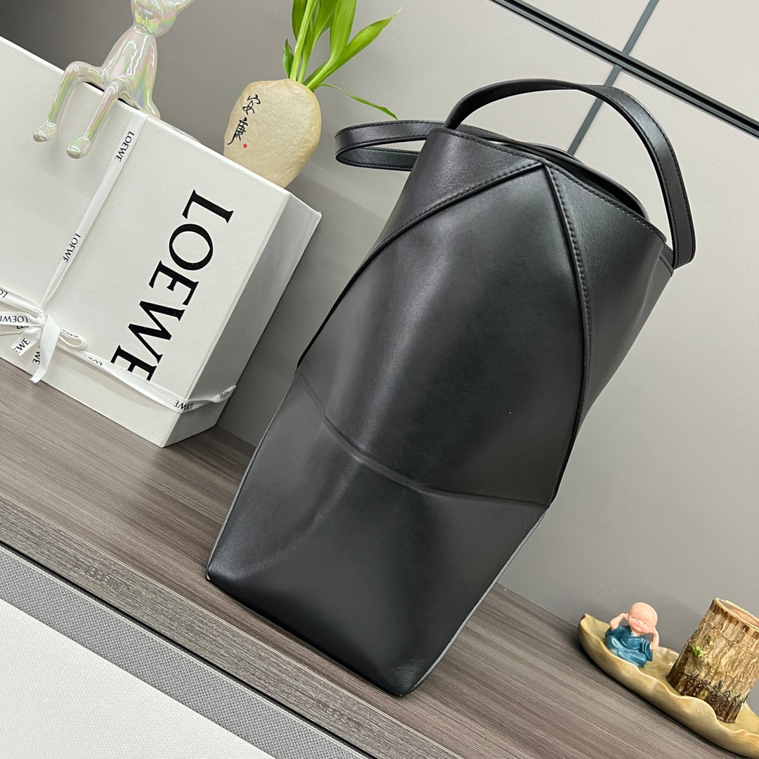 Puzzle fold tote in calfskin