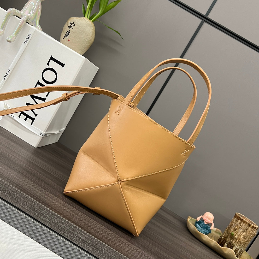 Puzzle fold tote in calfskin