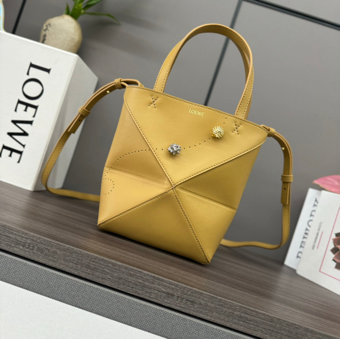 Puzzle fold tote in calfskin